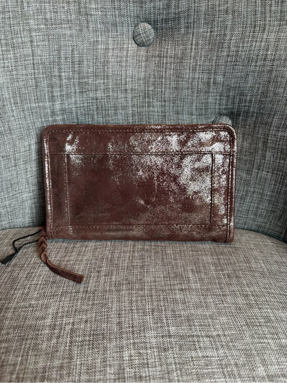 We The Free Brown / Gold Leather accordion zip wallet.